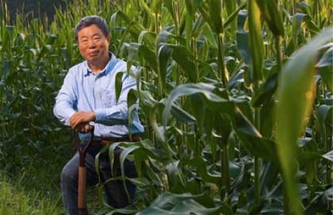 The late Dr. Changsheng Li, who originally developed Regrow's DNDC model, photographed in agricultural field