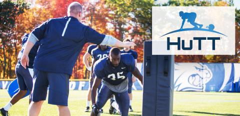 Football team training without helmets