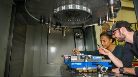 UNH researchers working on hydraulic press